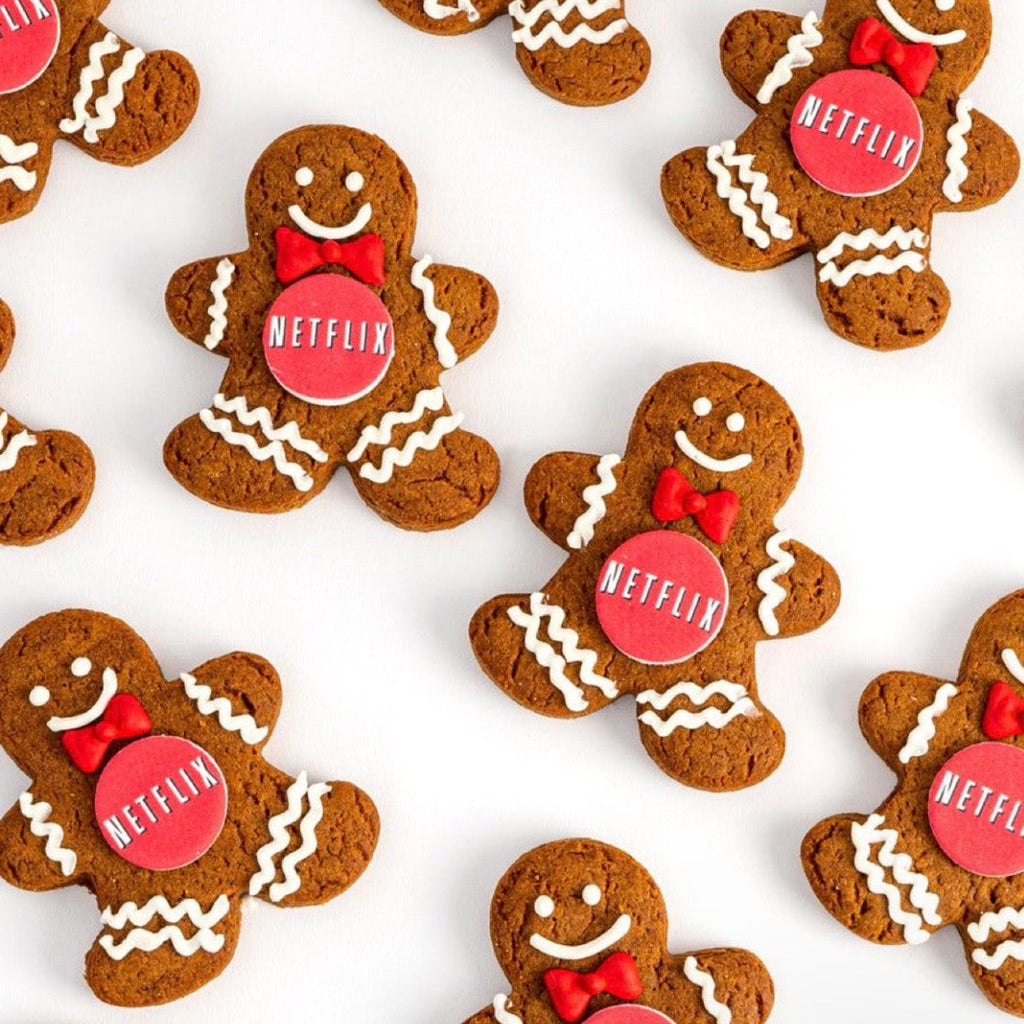 Gingerbread cookies with Netflix logo on a white background